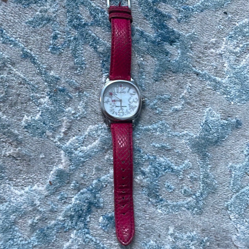 Pink Juicy watch with butterflies.